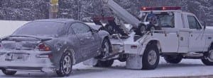 Truck towing car